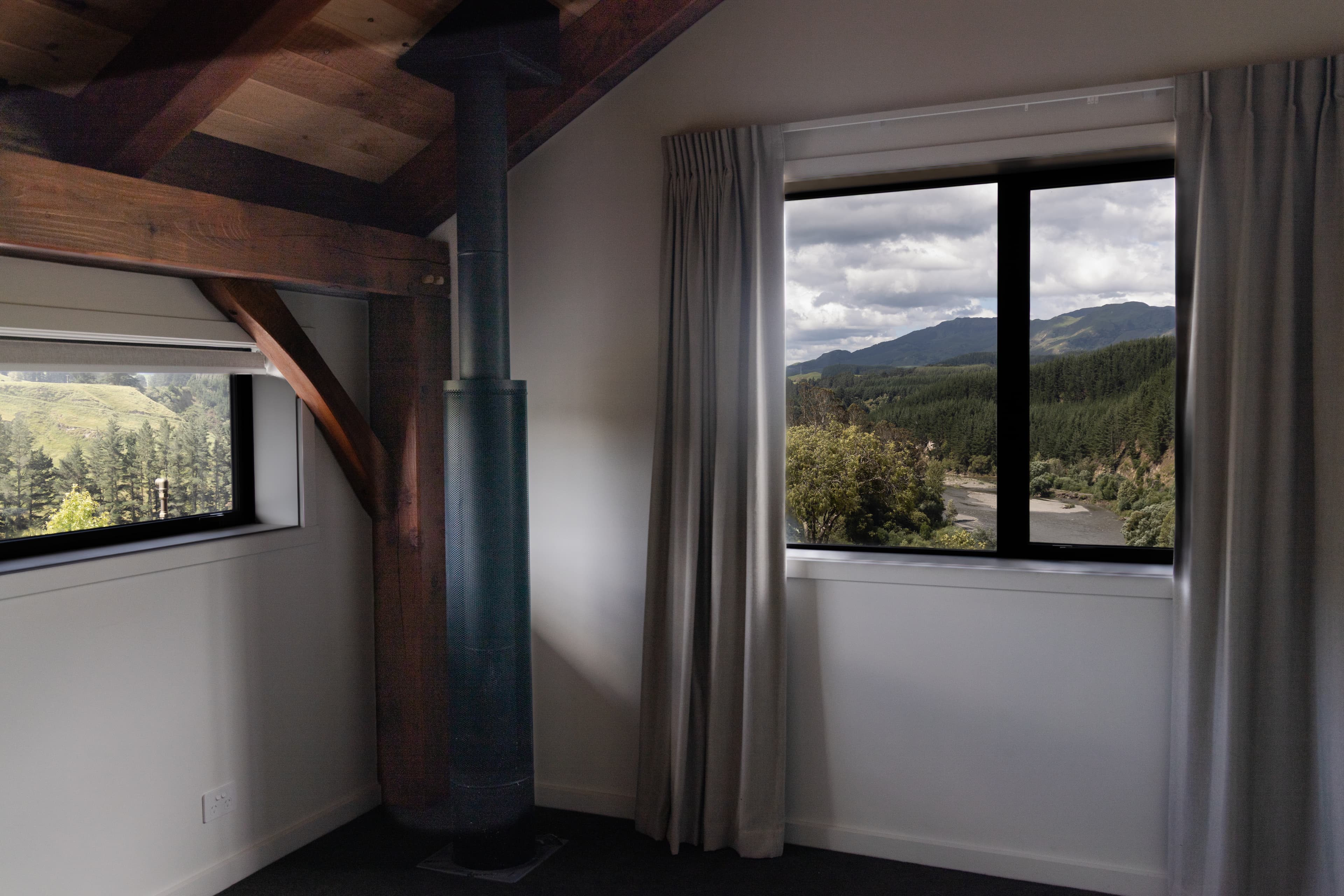 Chimney heating in upstairs bedroom of barn home